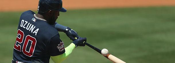Atlanta Braves baseball star Marcell Ozuna hits a homerun during an MLB game
