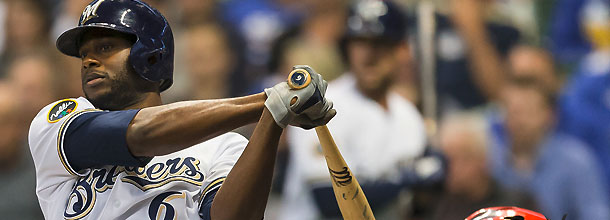 Milwaukee Brewers baseball star Lorenzo Cain hits a pitch in an MLB game