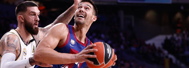 Players from Barcelona and Real Madrid in action in the basketball Euroleague
