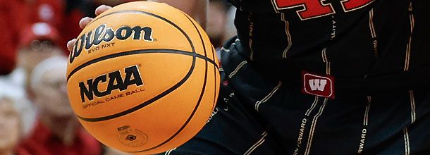 A College Basketball ball dribbled by an NCAAB player