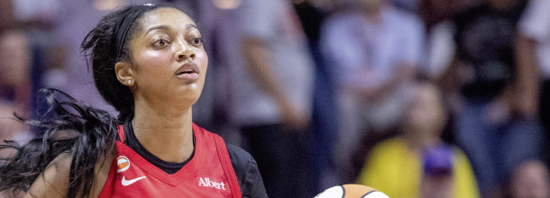 Atlanta Dream basketball star Angel Reese in action in a WNBA playoffs game