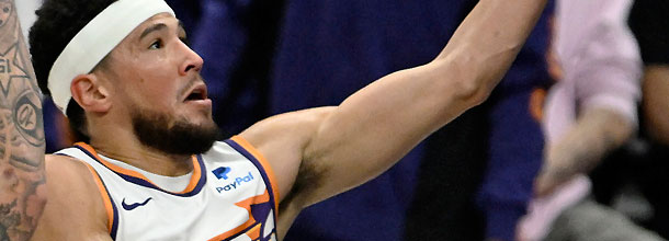 Phoenix Suns basketball star Devon Booker in action during an NBA game