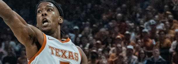 Texas Longhorns college basketball star Carr in action in an NCAAB game