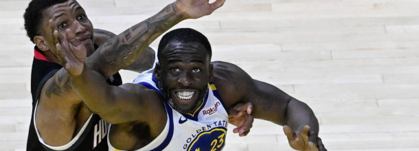 Basketball players from the Houston Rockets and the Golden State Warriors in action in the NBA