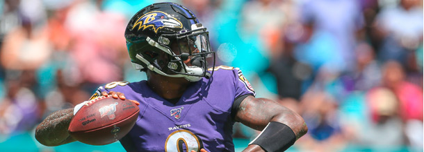 Baltimore Ravens Quarterback Lamar Jackson throws a touchdown pass in an NFL game