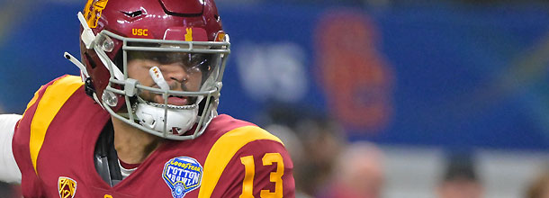 USC QB Caleb Williams in action in an NCAAF football fame