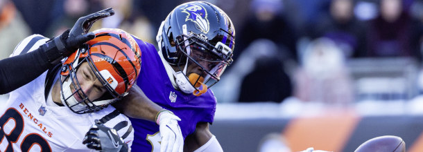 NFL players from the Cincinatti Bengals and the Baltimore Ravens in action in an NFL game
