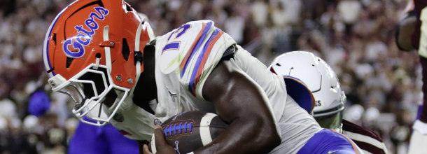 Florida Gators football star Baugh runs for a touchdoen in an NCAAF game