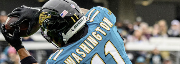 Jacksonville Jaguars WR Wahsington catches a touchdown in an NFL game
