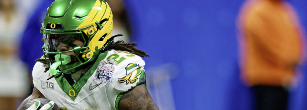 Oregon Ducks RB Dierre Hill in action in an NCAAF game