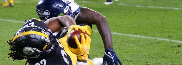 Players from the Pittsburgh Steelers and the Seattle Seahawks in action in the NFL
