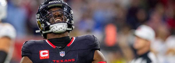 Houston Texans football star Al-Shaair celebrates a sack in an NFL game