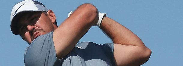 Golf star Brooks Koepka tees off at an LIV Golf event
