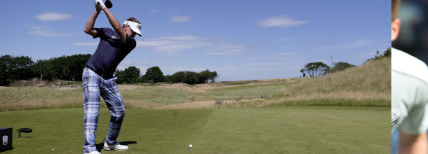 A golf player hits a tee shot in Scotland