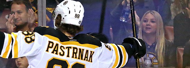 Boston Bruins hockey star David Pastrnak celebrates a goal in the NHL.