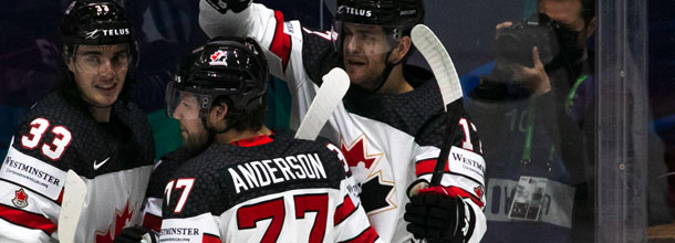 Canada ice hockey players celebrate a victory at the IIHF hockey world championships