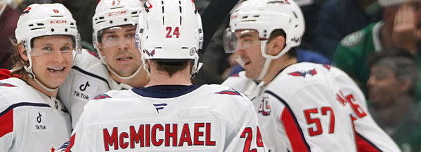 Hockey players from the Washington Capitals celebrate a win in the NHL