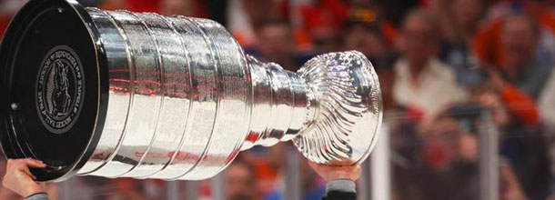 The NHL Stanley Cup trophy held aloft by the best ice hockey team