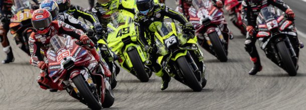 MotoGP riders battle for position during a Grand Prix