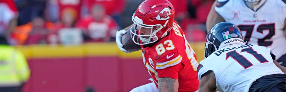 Players from the Kansas City Chiefs and the Houston Texans battle for the ball in the NFL