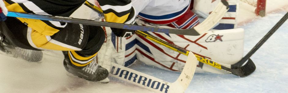 NHL ice hockey players in action on the ice