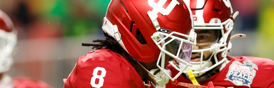 Indiana Hoosiers football stars Black and Sarratt in action in a NCAAF game