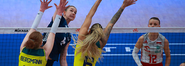 Volleyball players from Brazil and Poland in action in a game ahead of the 2024 Paris Olympic Games