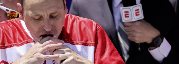 Joey Chestnut eating hot dogs