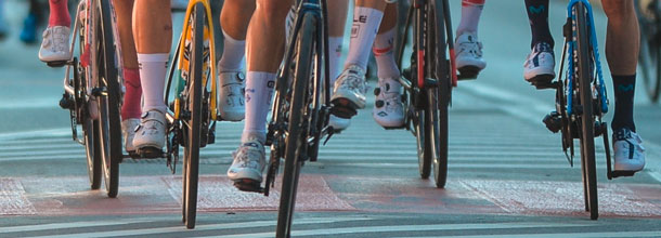 Cyclists sprint across the finish line of the Tour de France cycling race