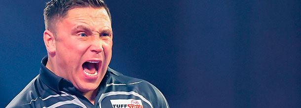 Darts star Gerwyn Price celebrates a victory in the Premier League