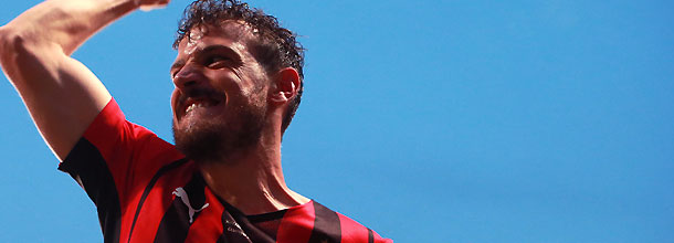 AC Milan soccer star Alessandro Florenzi celebrates winning the Serie A championship with his team