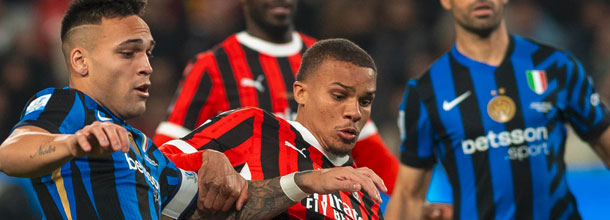 Soccer players from AC Milan and Inter Milan in action in the Coppa Italia