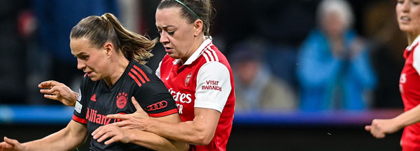 Soccer players from Arsenal and Bayern Munich in action in the UEFA Champions League