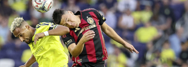 Soccer players from Atlanta and Nashville in action in an MLS game