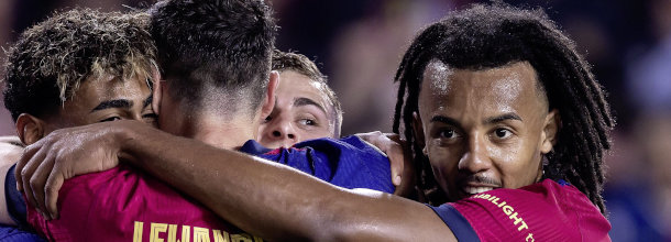 Barcelona soccer players celebrate a victory in the UEFA CHampions League