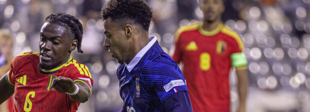 Soccer players from Belgium and France in action in the UEFA Nations League
