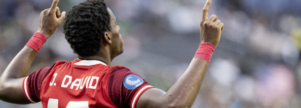 Canada soccer star Jonathan David celebrates a goal in an international game
