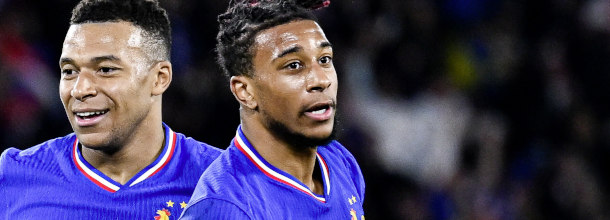 France soccer stars Mbappe and Olise in action in a World Cup qualifier