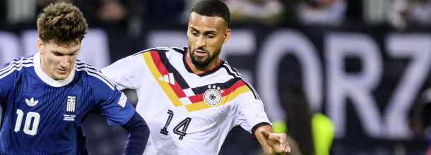 Soccer players from Greece and Germany in action in the UEFA Nations League