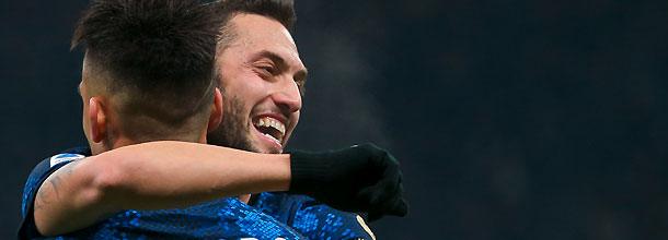 Inter Milan soccer stars celebrate a goal in a Serie A game