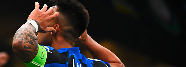 Inter Milan soccer star Lautaro Martinez celebrates a goal in the UEFA Champions League with the fans