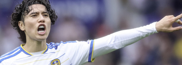 Leeds United soccer star Tanaka points during a game in the Premier League