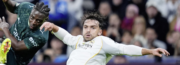 Soccer players from Manchester City and Real Madrid in action in a UEFA Champions League game