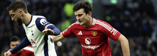 Soccer players from Tottenham and Manchester United in action in the Premier League