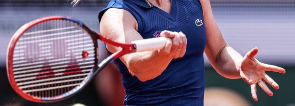 A tennis player hits a shot on the WTA Tour